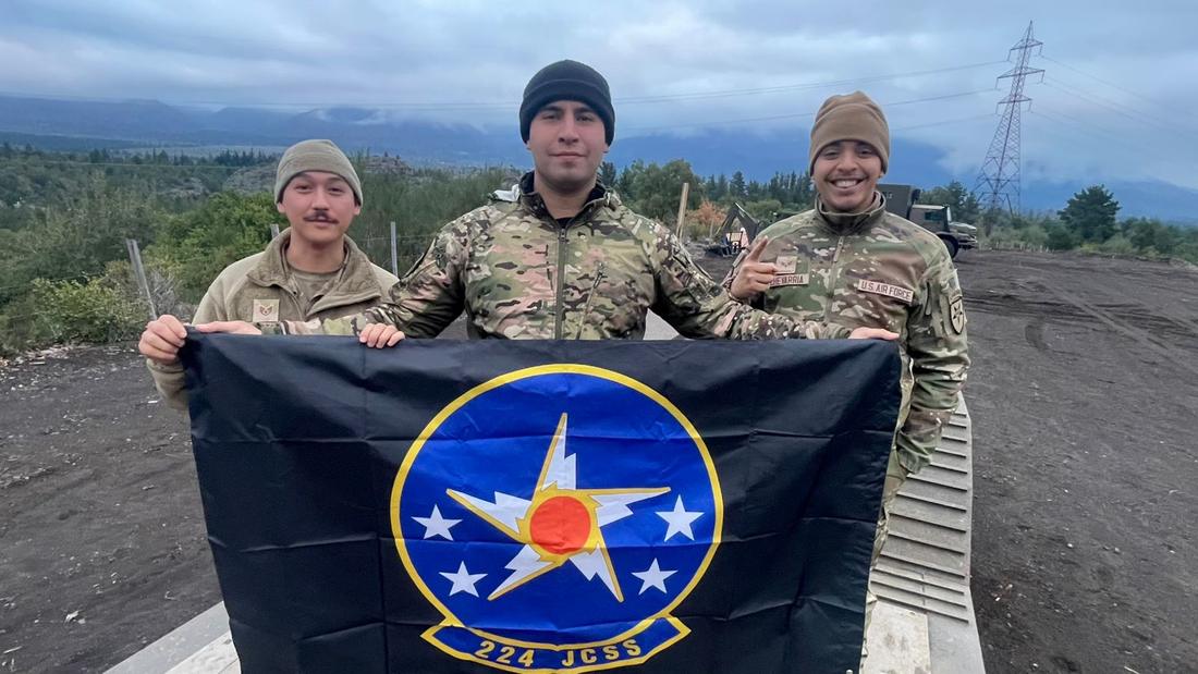 224th JCSS Airmen with the squadron flag during Exercise Southern Vanguard in Chile